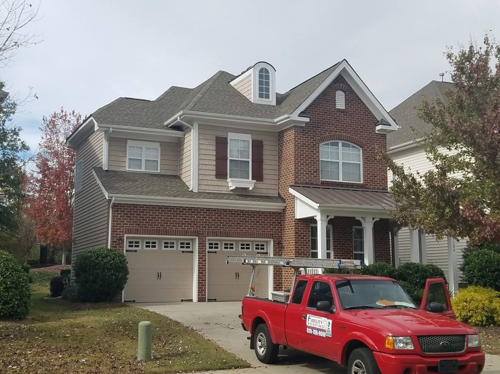 home with new asphalt shingle roof in hudson-nc Home with asphalt shingle roof in Hudson NC